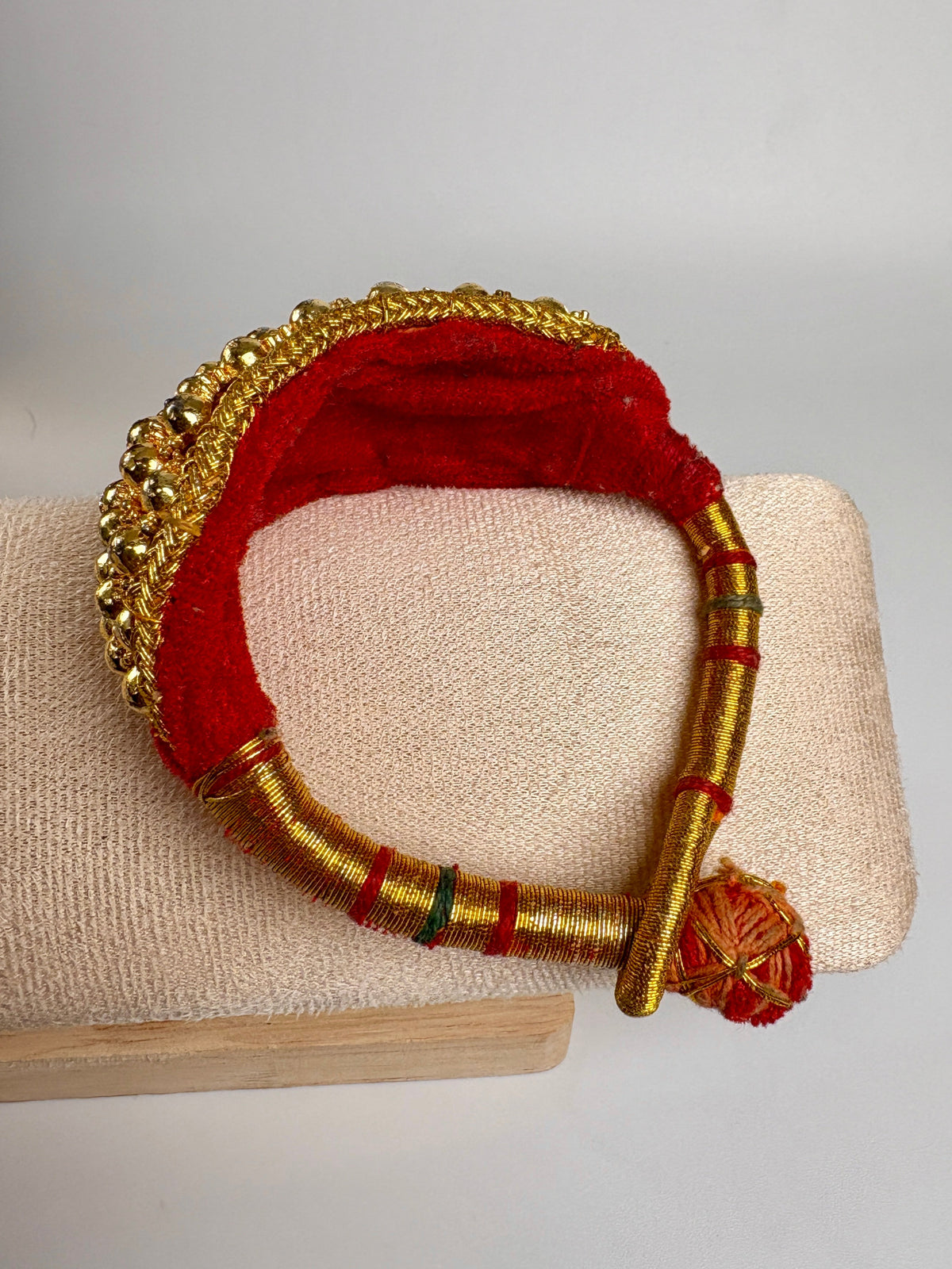 Rajasthani Golden Puncha with Red Velvet Bracelet